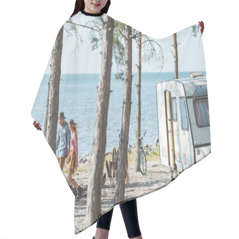 Personality  Young Couple Holding Hands And Walking In Nature Near Campervan Hair Cutting Cape