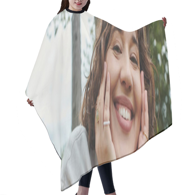 Personality  A Young Woman In A White Shirt Smiles Cheerfully While Resting During A Sunny Summer Picnic. Hair Cutting Cape