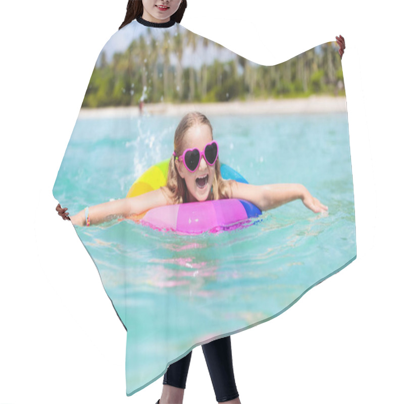 Personality  Child With Inflatable Ring On Beautiful Beach. Little Girl Swimming In Exotic Sea. Ocean Vacation With Kid. Children Play On Summer Beach. Water Fun. Kids Swim. Family Holiday On Tropical Island. Hair Cutting Cape