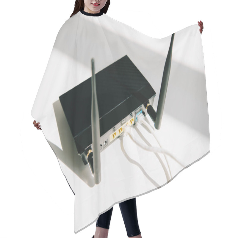 Personality  Black Plugged Router On White Office Table In Sunshine Hair Cutting Cape