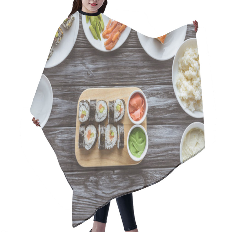 Personality  Top View Of Delicious Sushi Rolls With Ingredients On Wooden Table Hair Cutting Cape