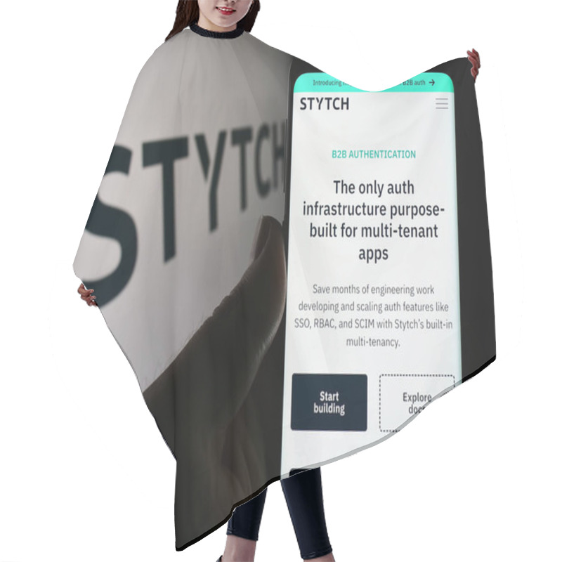 Personality  Stuttgart, Germany - 05-14-2024: Person Holding Smartphone With Webpage Of US Identity Platform Company Stytch Inc. In Front Of Business Logo. Focus On Center Of Phone Display. Hair Cutting Cape