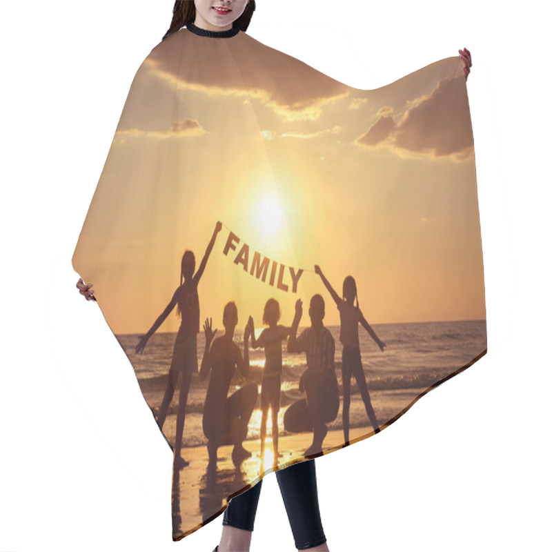 Personality  Happy Family Standing On The Beach At The Sunset Time.  Hair Cutting Cape