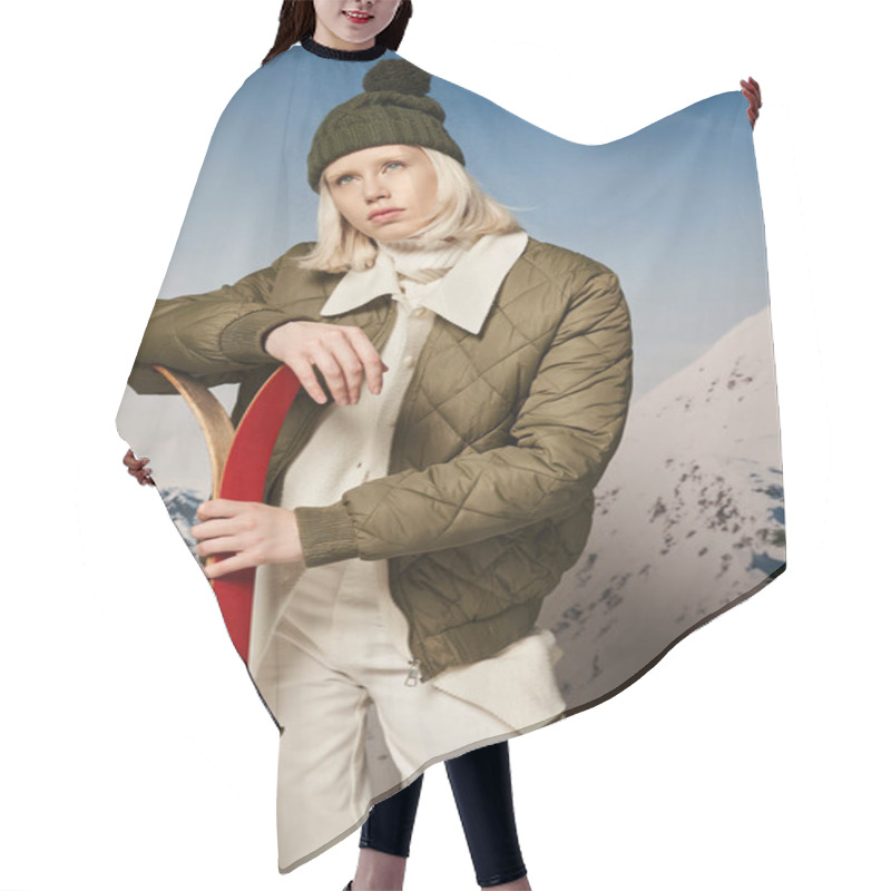 Personality  Stylish Blonde Woman In Jacket With Bobble Hat And Skis In Hands Looking Away, Winter Concept Hair Cutting Cape