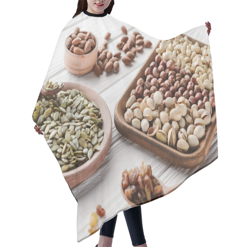 Personality  Mixed Nuts And Raisins On White Wooden Background Hair Cutting Cape