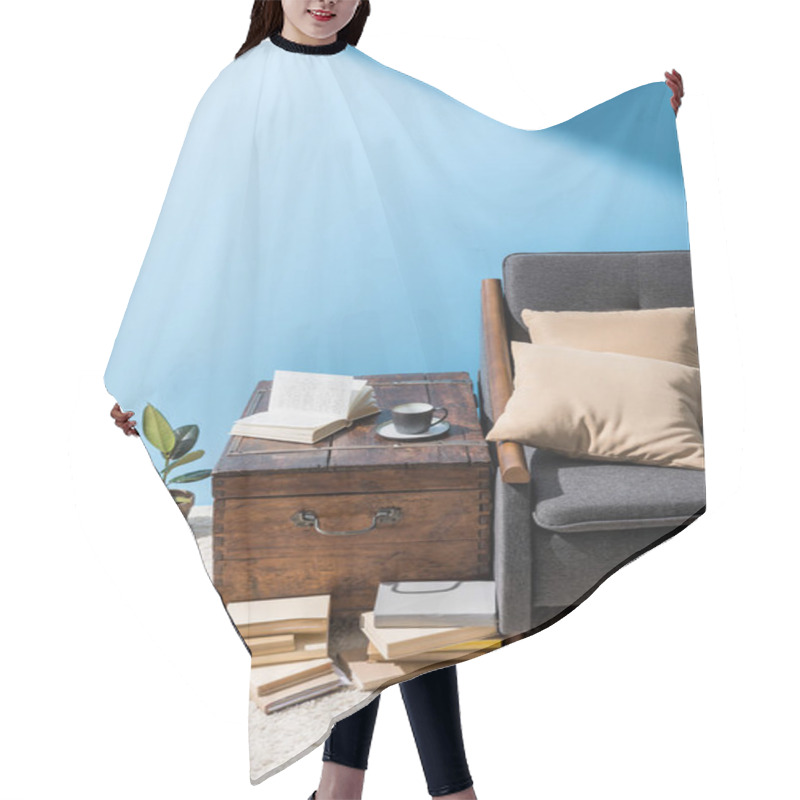 Personality  Old Wooden Chest With Cup Of Coffee And Books Near Couch In Front Of Blue Wall Hair Cutting Cape