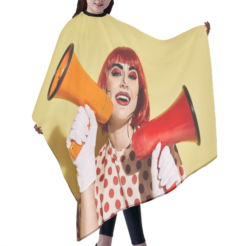 Personality  A Woman With Red Hair And Pop Art Makeup Holds A Red And Orange Megaphone, Exuding Confidence On A Yellow Background. Hair Cutting Cape