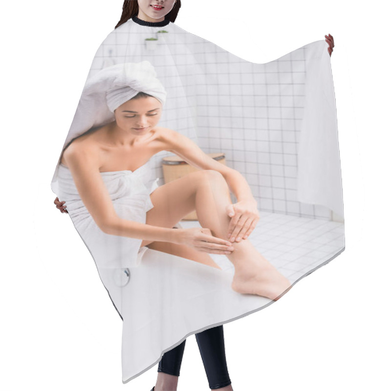 Personality  Young Woman With White Towel On Head Applying Body Lotion On Leg While Sitting On Bathtub Hair Cutting Cape