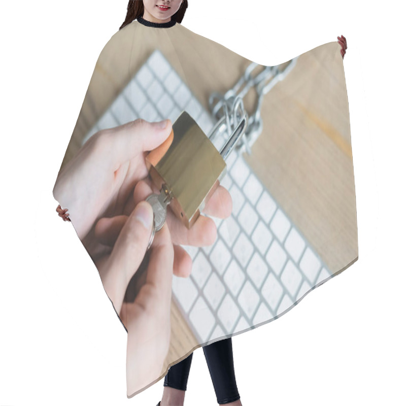 Personality  Cropped View Of Programmer Holding Padlock And Key Near Keyboard In Office  Hair Cutting Cape