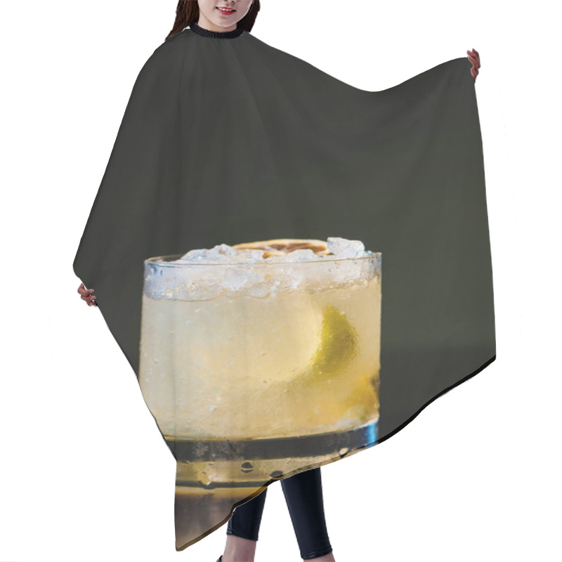 Personality  Tropical Exotic Caipirinha With Ice And Lemon Garnishing On Black Background, Concept Hair Cutting Cape