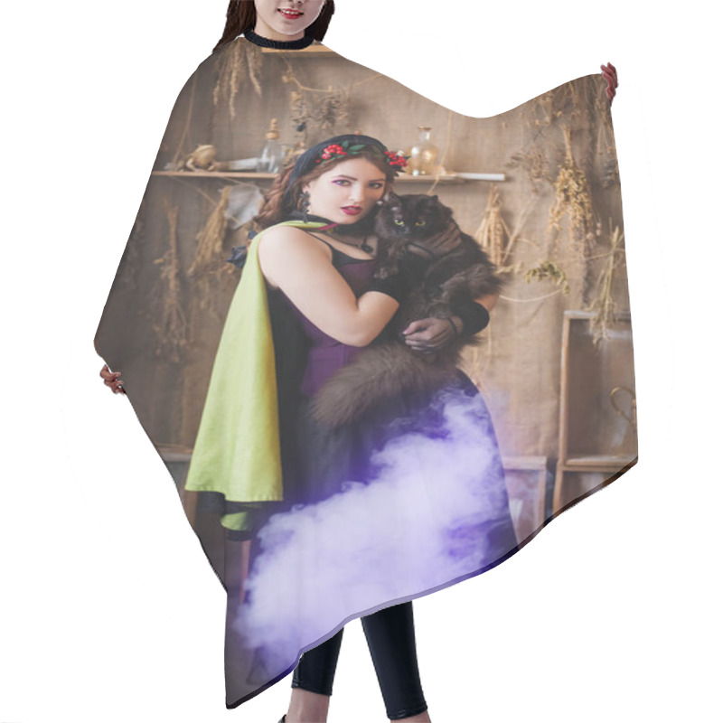 Personality  A Young, Attractive Witch With A Black Cat In Her Hands Is Cooking A Potion In A Large Black Cauldron Emitting Magical Purple Smoke. Hair Cutting Cape