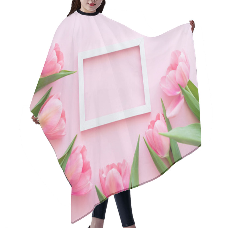 Personality  Flat Lay Of Blossoming Tulips With Green Leaves Near Frame On Pink, Mothers Day Concept  Hair Cutting Cape