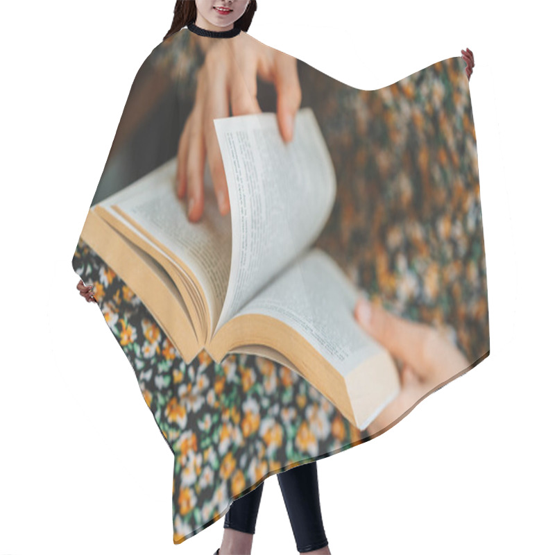 Personality  Close Up Image Of Woman Reading A Book In Cafe. Hair Cutting Cape