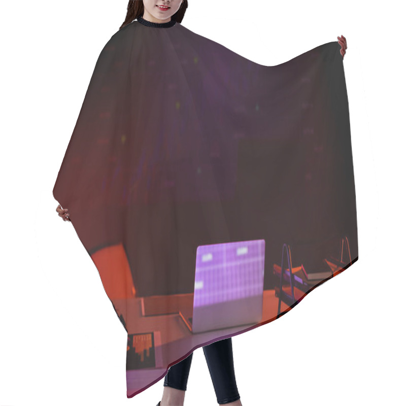 Personality  Devices Near Notebooks And Papers With Charts On Table On Black Background  Hair Cutting Cape