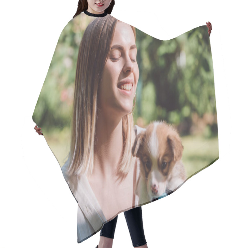 Personality  Happy Blonde Girl With Closed Eyes Holding Welsh Corgi Puppy In Gift Box With Blue Ribbon Hair Cutting Cape