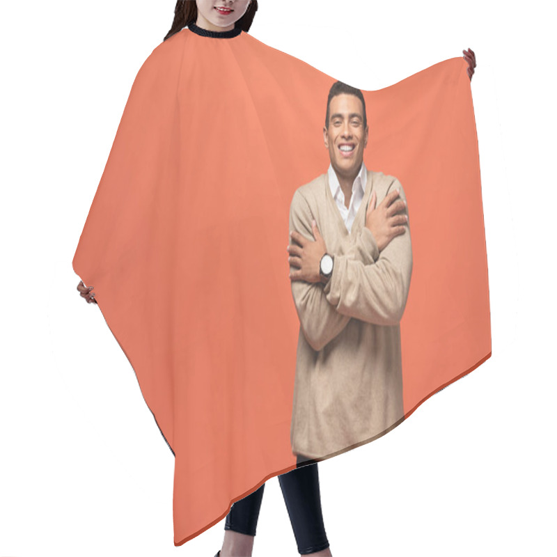 Personality  Happy Mixed Race Man In Beige Sweater Feeling Cold Isolated On Orange Hair Cutting Cape