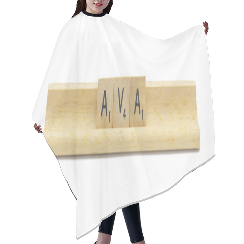 Personality  Concept Of Popular Newborn Baby Girl First Name Of AVA Made With Square Wooden Tile English Alphabet Letters With Natural Color And Grain On A Wood Rack Holder Isolated On White Background Hair Cutting Cape