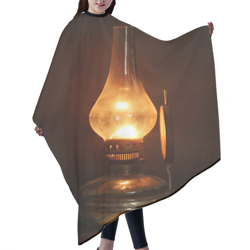 Personality  Old Lamp Illuminates Darkness Of The Night.  Hair Cutting Cape