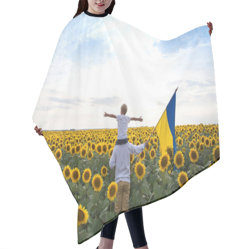 Personality  Dad And Son, Who Sits On His Shoulders With Arms Apart, Stand With Flag Of Ukraine On Blooming Sunflower Field. Patriotism, Pride, Unity, Faith In Victory. Independence Day. Ukrainians Against War Hair Cutting Cape