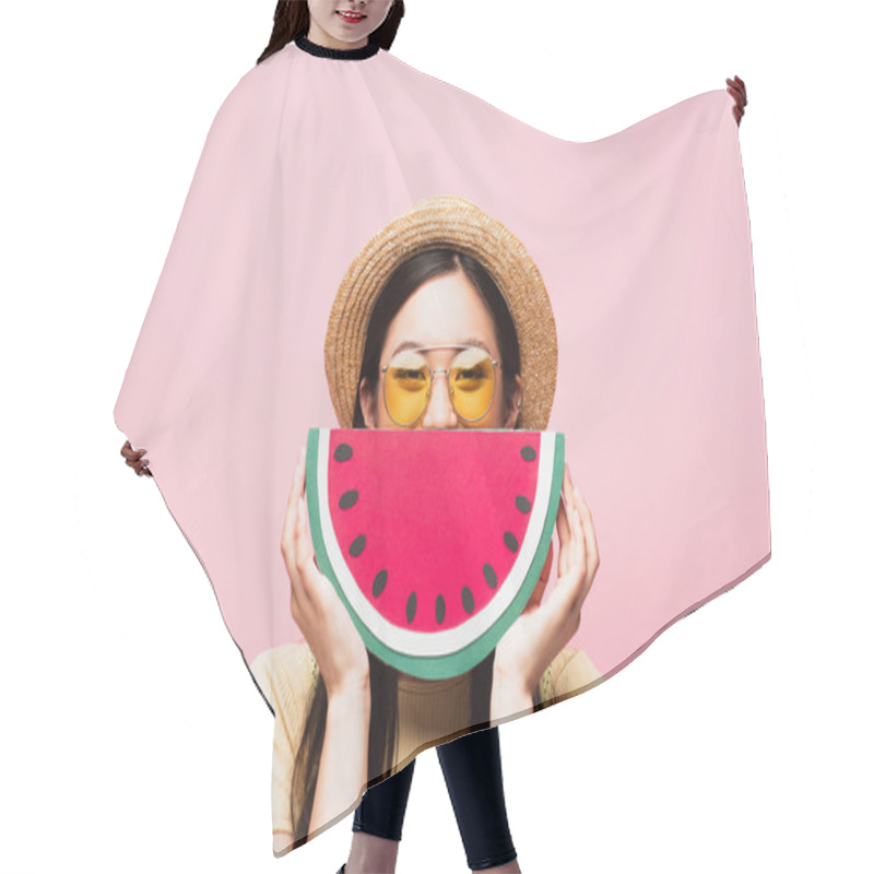 Personality  Asian Girl In Sunglasses And Straw Hat Covering Face With Paper Watermelon Isolated On Pink  Hair Cutting Cape