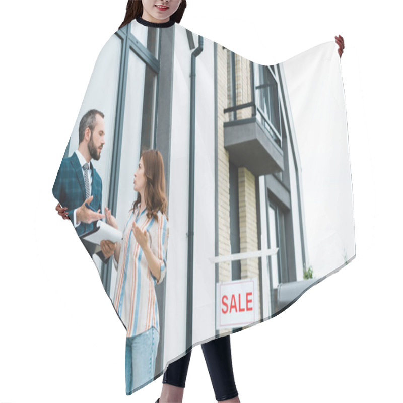 Personality  Low Angle View Of Woman Gesturing While Looking At Broker Near House  Hair Cutting Cape