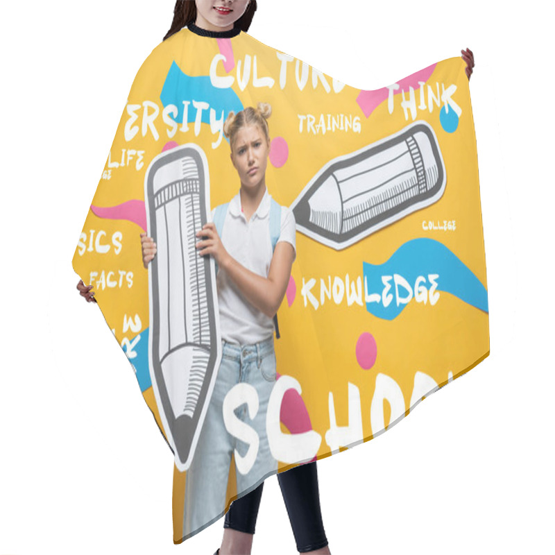 Personality  Sad Schoolgirl Holding Paper Pencil And Looking At Camera Near Lettering On Yellow Background Hair Cutting Cape