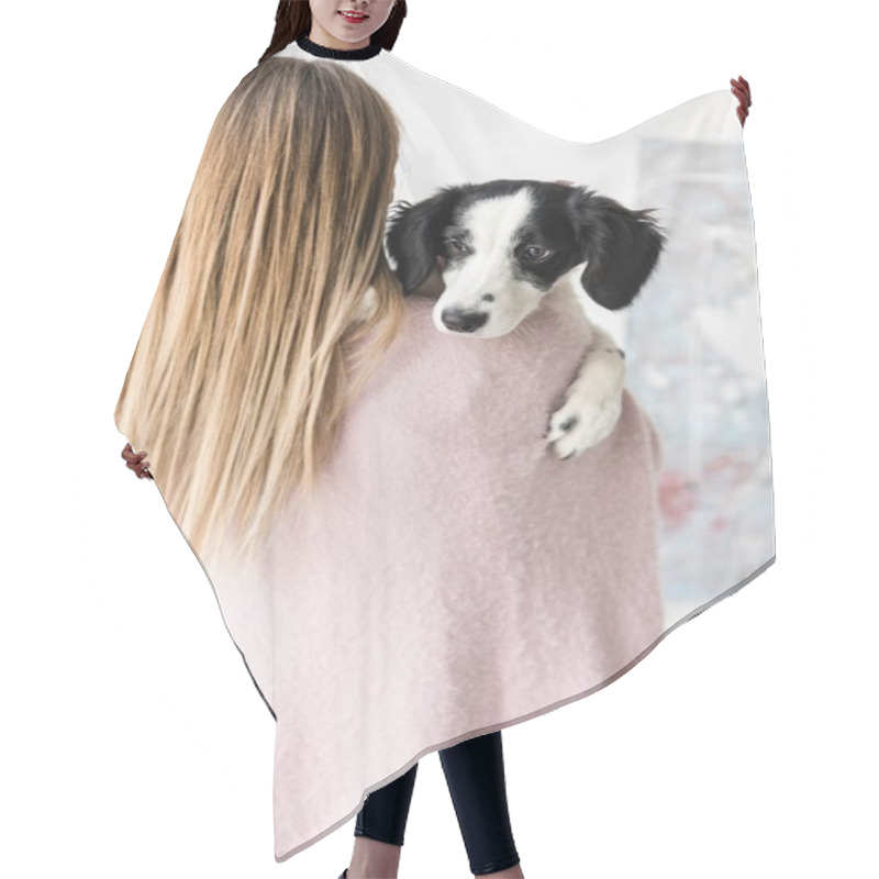 Personality  Rear View Of Woman Holding Cute Black And White Puppy  Hair Cutting Cape