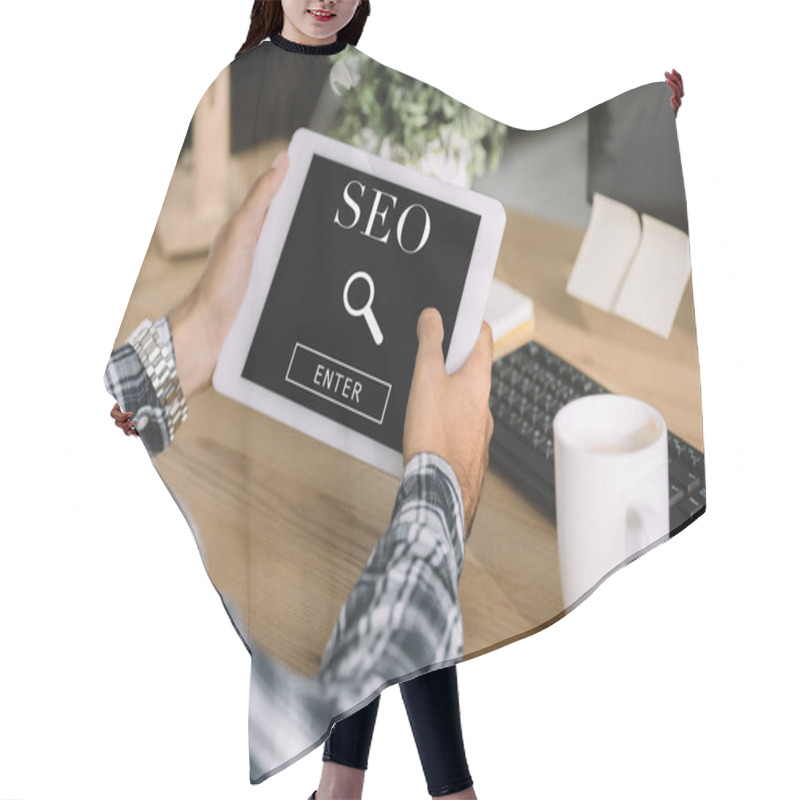 Personality  Cropped Shot Of Developer Using Tablet With SEO Search Hair Cutting Cape