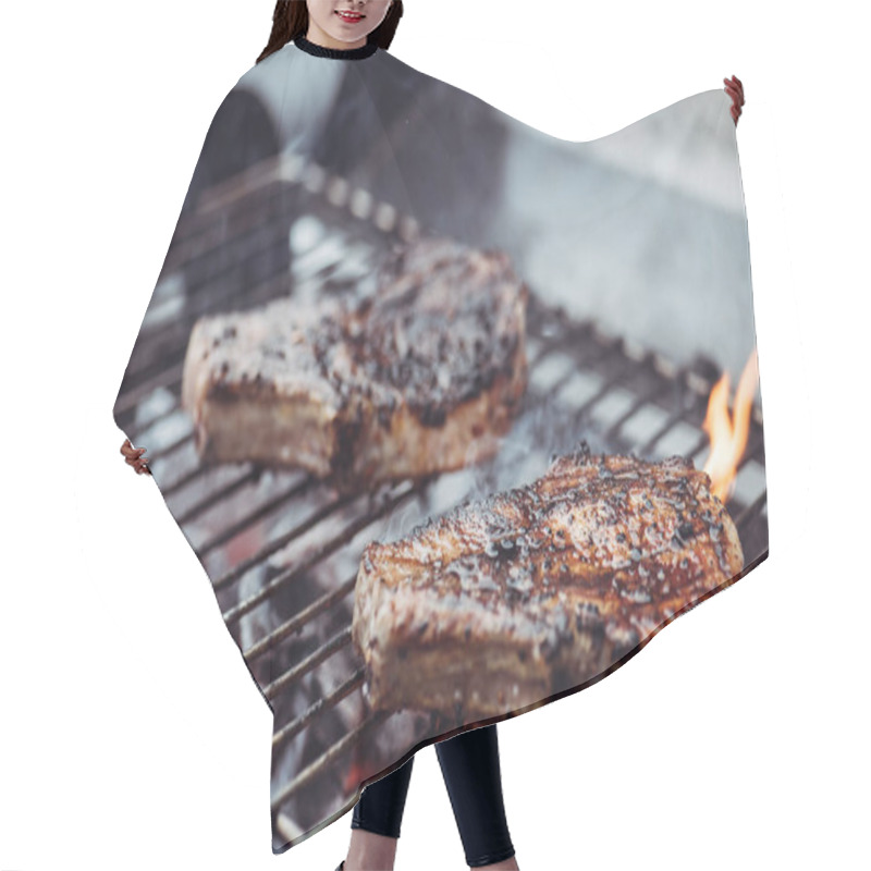 Personality  Selective Focus Of Juicy Tasty Steaks Grilling On Barbecue Grid With Smoke Hair Cutting Cape