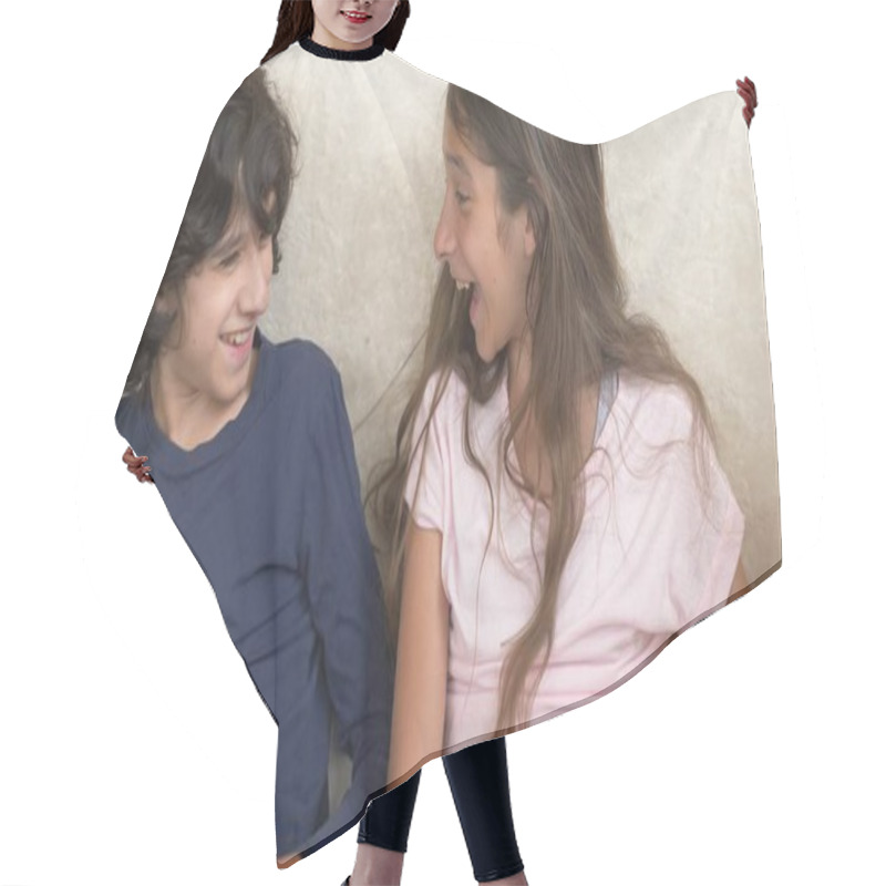 Personality  Portrait Of Adorable Brother And Sister, Teenagers Smiling And Laughing With Funny Expression On Their Faces. Family Happiness And Relations. Hair Cutting Cape