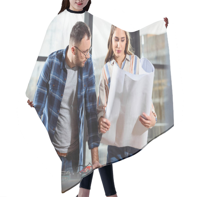 Personality  Woman Showing Project Blueprint To Male Engineer Hair Cutting Cape