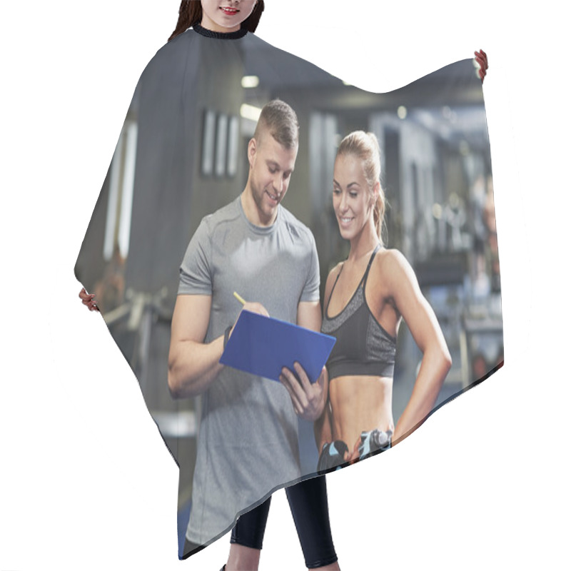 Personality  Smiling Young Woman With Personal Trainer In Gym Hair Cutting Cape