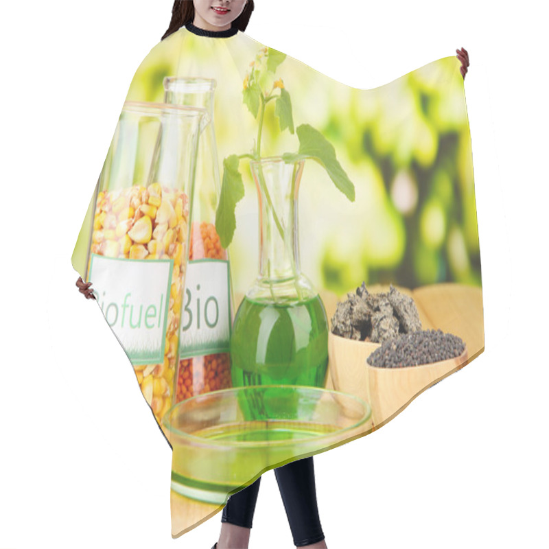 Personality  Conceptual Photo Of Bio Fuel. On Bright Background Hair Cutting Cape