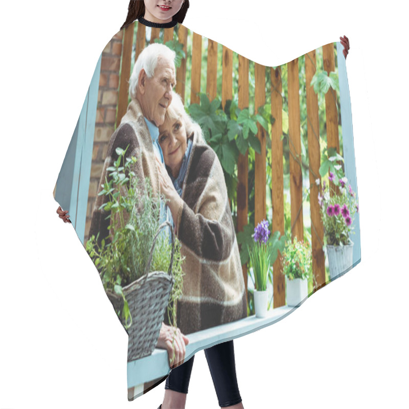 Personality  Selective Focus Of Happy Senior Woman In Plaid Blanket Standing With Husband On Terrace  Hair Cutting Cape