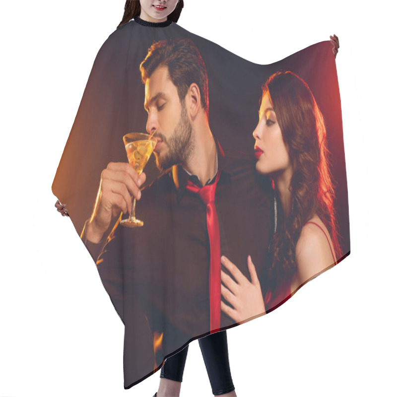 Personality  Handsome Man Drinking Cocktail Near Elegant Girlfriend On Black Background With Lighting Hair Cutting Cape