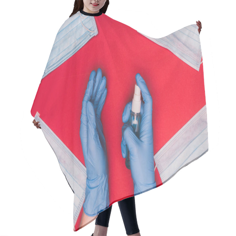 Personality  Top View Of Doctor Holding Hand Sanitizer Near Medical Masks On Red Background Hair Cutting Cape