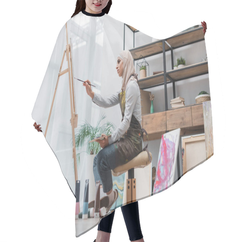 Personality  Side View Of Muslim Woman Drawing On Easel In Home Studio Hair Cutting Cape