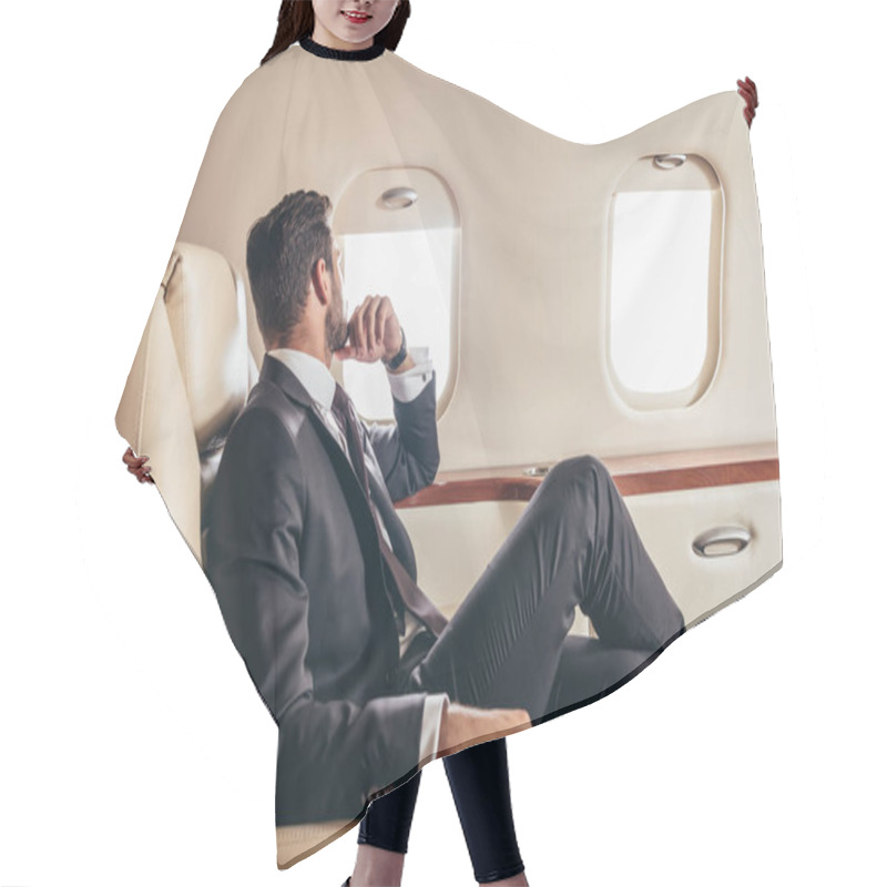 Personality  Back View Of Businessman In Suit Looking Through Window In Private Plane  Hair Cutting Cape