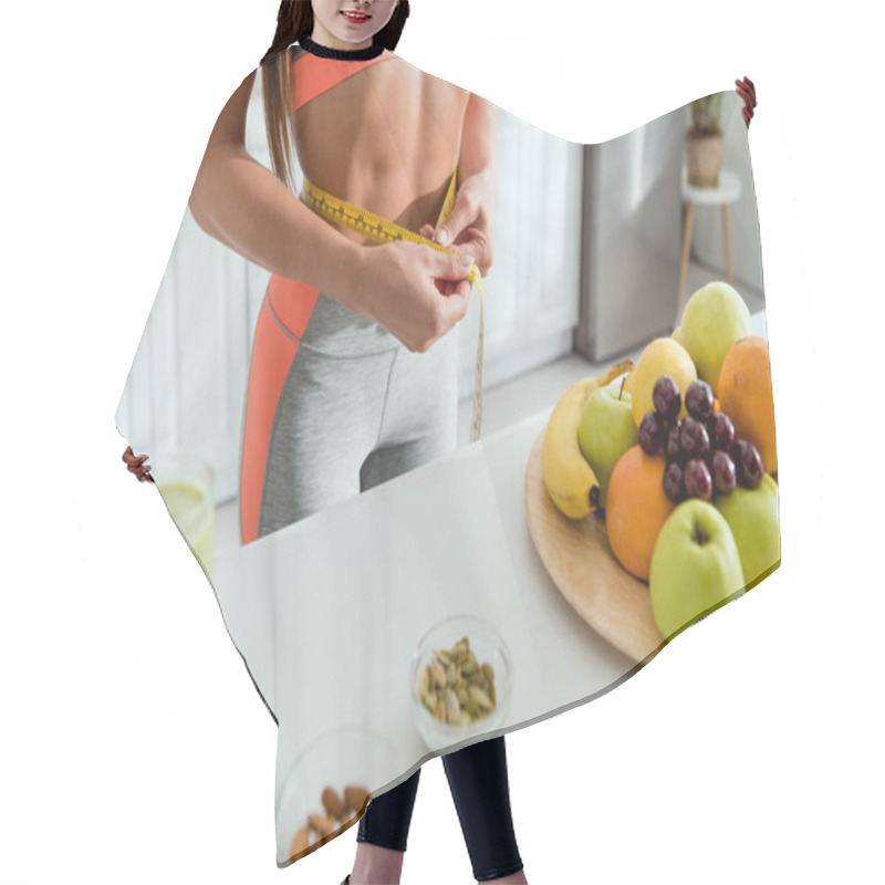 Personality  Cropped View Of Girl Measuring Waist Near Fruits  Hair Cutting Cape