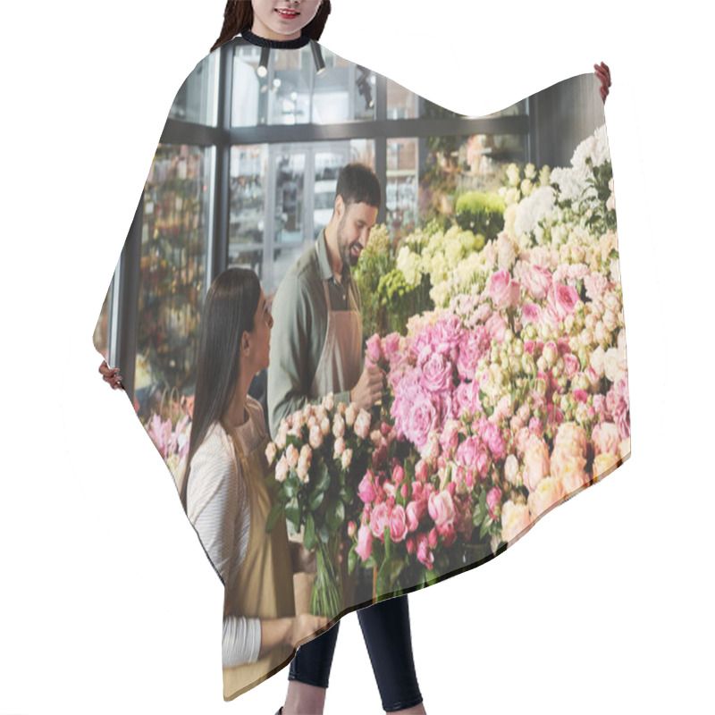 Personality  A Married Couple Joyfully Arranges Beautiful Roses And Plants In Their Florist Shop. Hair Cutting Cape