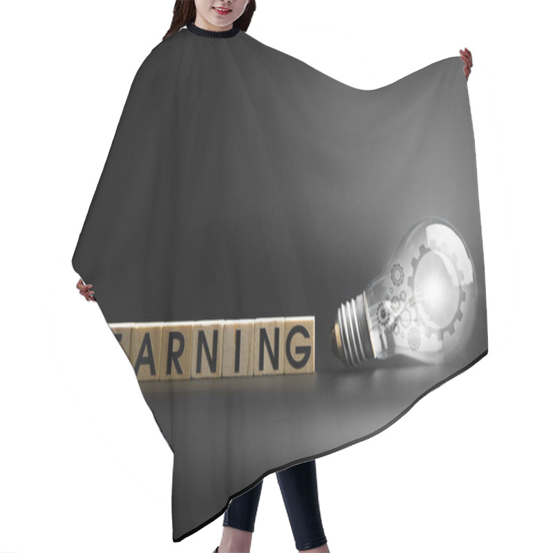 Personality  Light Bulb With The Word Learning. 3 D. Hair Cutting Cape