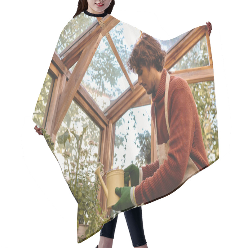 Personality  Amidst A Vibrant Greenhouse, A Young And Handsome Man Lovingly Waters A Variety Of Plants. Sunlight Filters Through The Glass, Illuminating His Green Gloves And Thoughtful Expression. Hair Cutting Cape