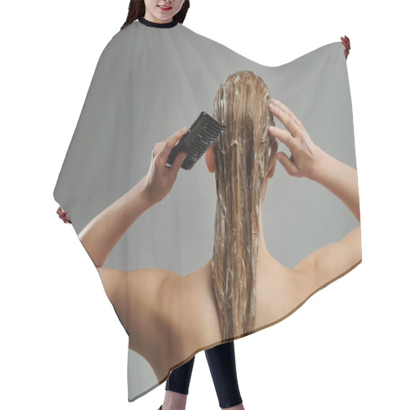 Personality  A Young Woman Holds A Hair Brush, Combing Wet Hair With Care. Hair Cutting Cape