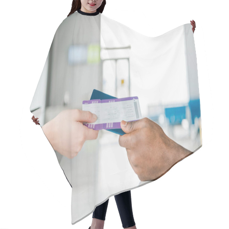 Personality  Cropped View Of Airport Worker And African American Passenger Holding Passport And Air Ticket Hair Cutting Cape