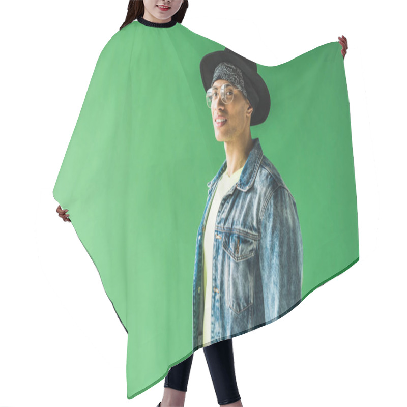 Personality  Stylish Mixed Race Man Looking At Camera And Smiling On Green Screen With Copy Space Hair Cutting Cape