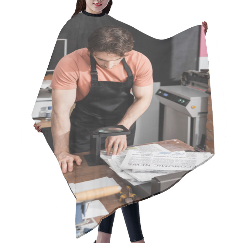 Personality  Worker In Apron Checking Quality Of Newspaper Through Magnifying Glass In Print Center  Hair Cutting Cape