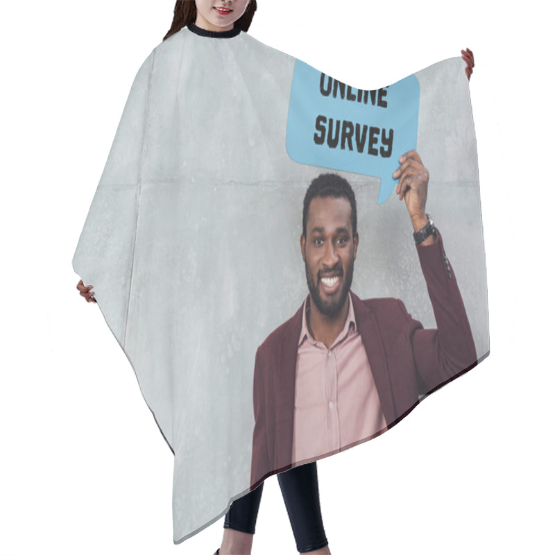 Personality  Smiling African American Casual Businessman Looking At Camera And Holding Speech Bubble With Online Survey Lettering Hair Cutting Cape