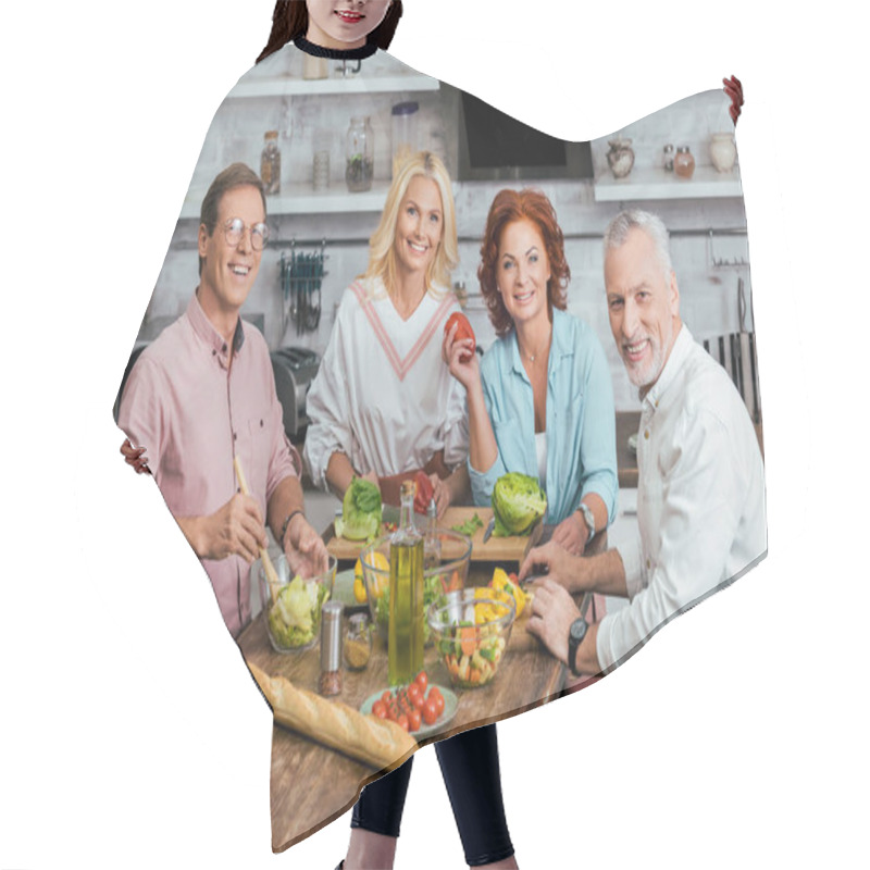 Personality  Smiling Mature Friends Preparing Salad For Dinner At Home Hair Cutting Cape