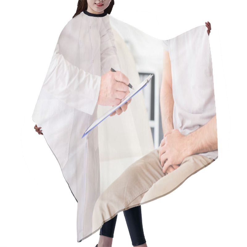 Personality  Young Man Visiting Urologist In Clinic Hair Cutting Cape