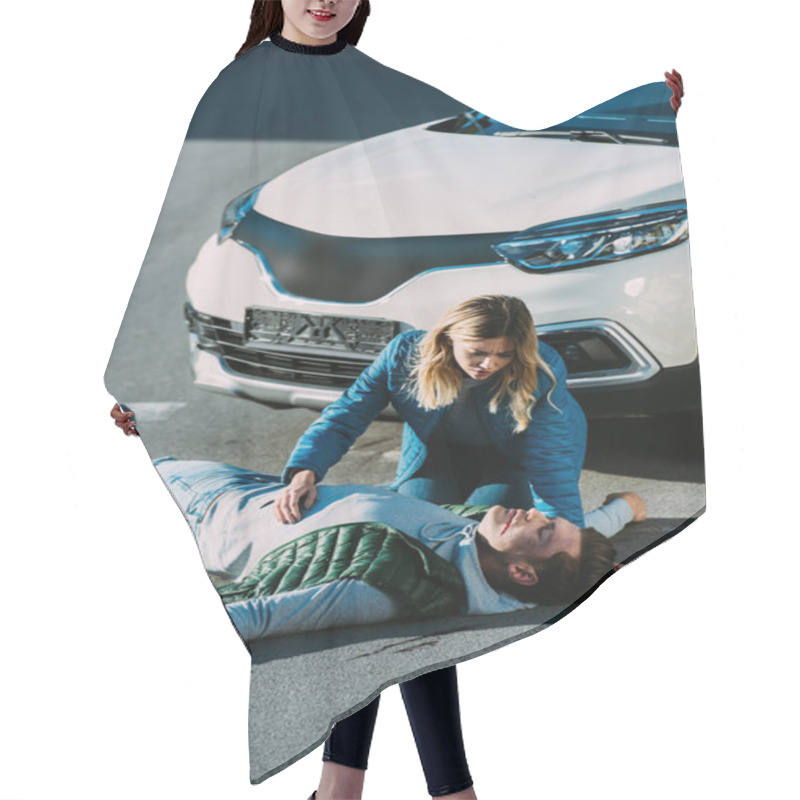 Personality  High Angle View Of Young Woman Looking At Touching Injured Man Lying On Road After Traffic Accident Hair Cutting Cape